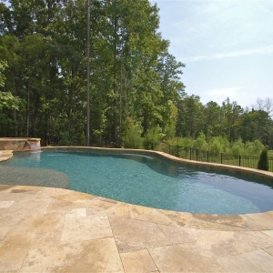 109. Custom pool and spa with built on the side of a hill