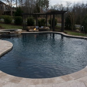 116. Lagoon shape pool with spa. Fire pit and seating area