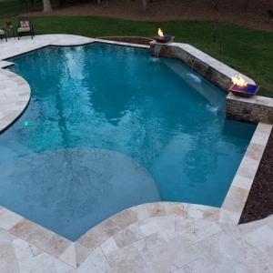 123. Custom design pool with fire pots and Ivory Travertine patio