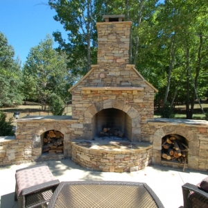 410. Custom stone outdoor fireplace