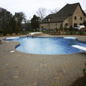 307. Large lagoon style pool with spa, slide, and diving board